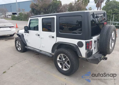 2016 Jeep Wrangler Unlimited Sport z USA, uszkodzony, nr VIN 1C4BJWDG5GL288901